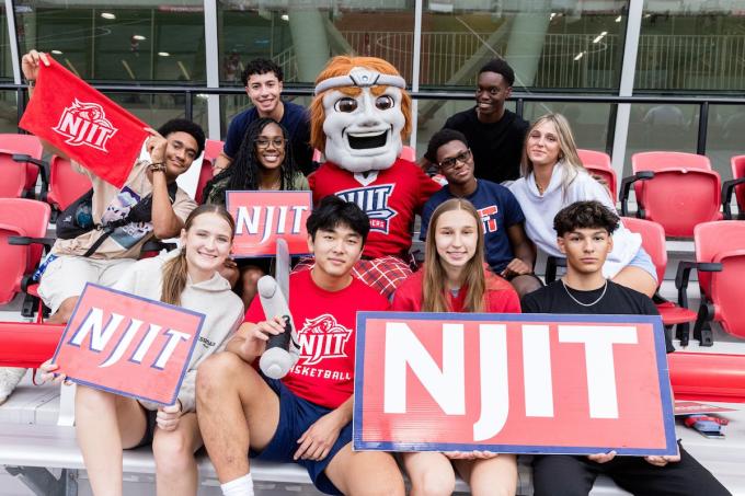 Students with Highlander mascot