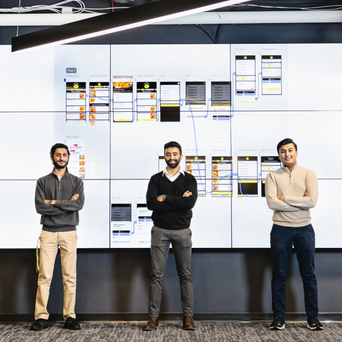 students showing a group project