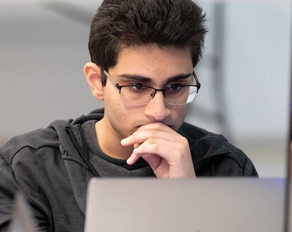 NJIT student in front of computer
