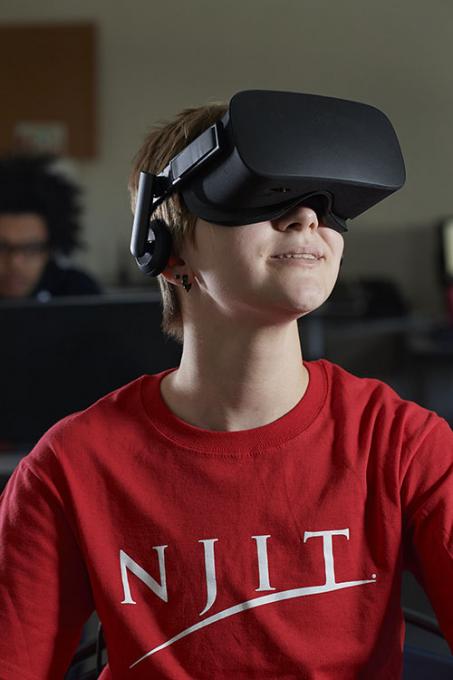 NJIT female student with VR goggles